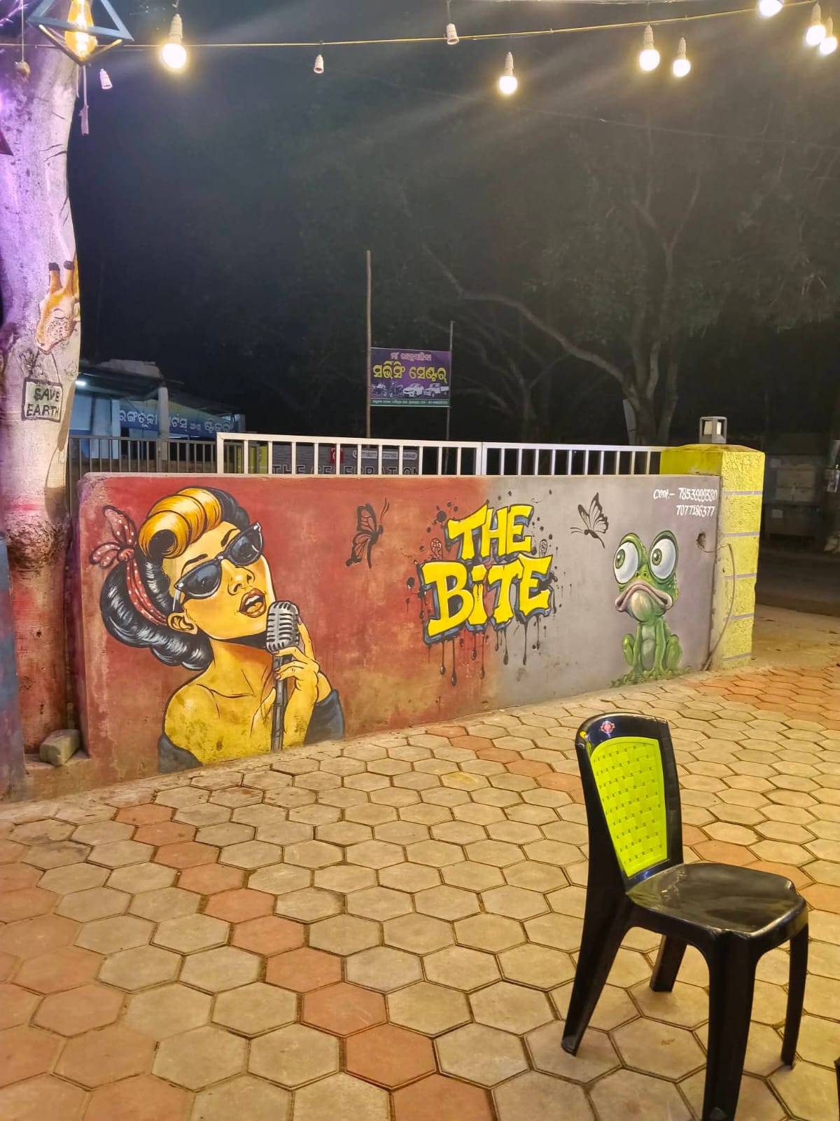 The Bite at night — lit up and welcoming.